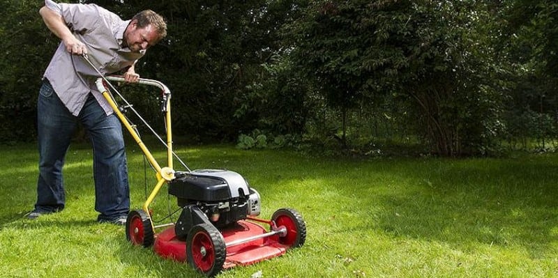 Man mowing lawn